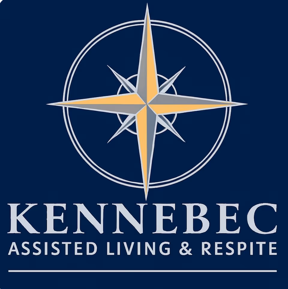 Dark blue sign showing a compass rose logo and 'KENNEBEC Assisted Living & Respite' text.