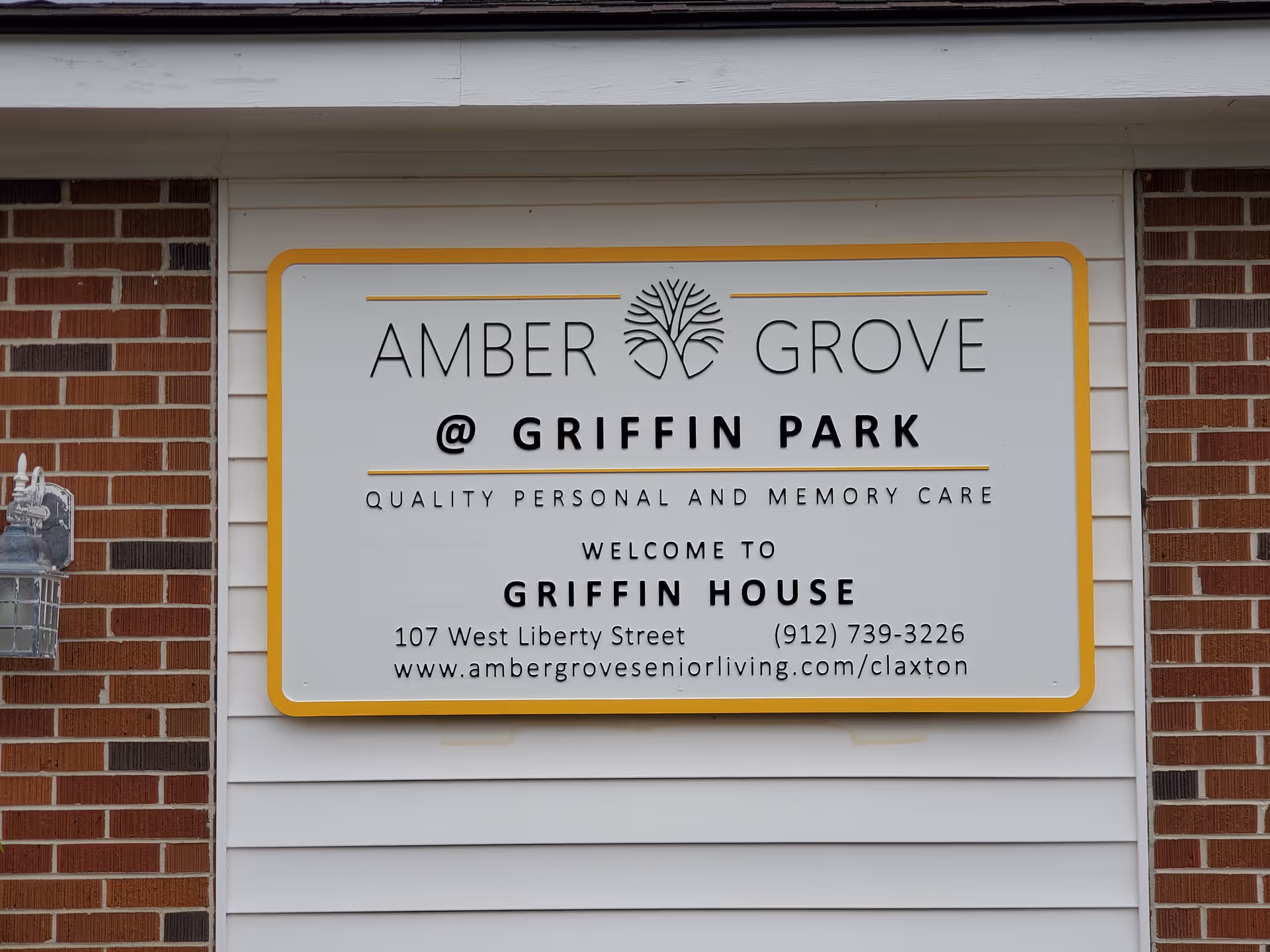 Exterior wall featuring Amber Grove at Griffin Park sign for Griffin House facility
