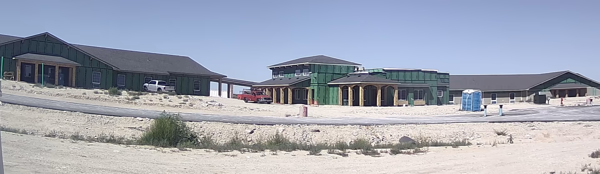 Exterior view of Bluestem Village senior living facility under construction.