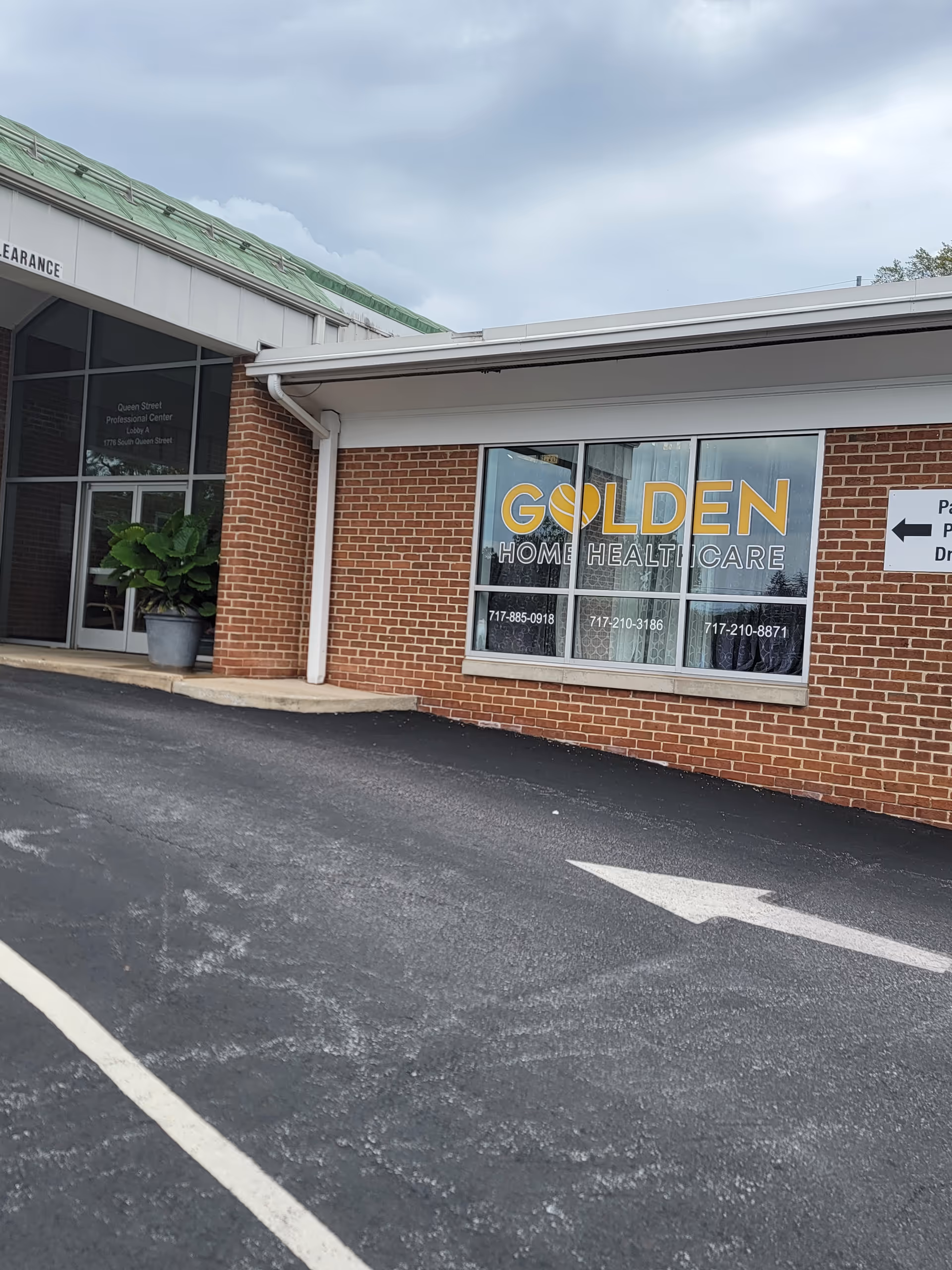 Outside view of Golden Home Healthcare building with brick exterior and signage.