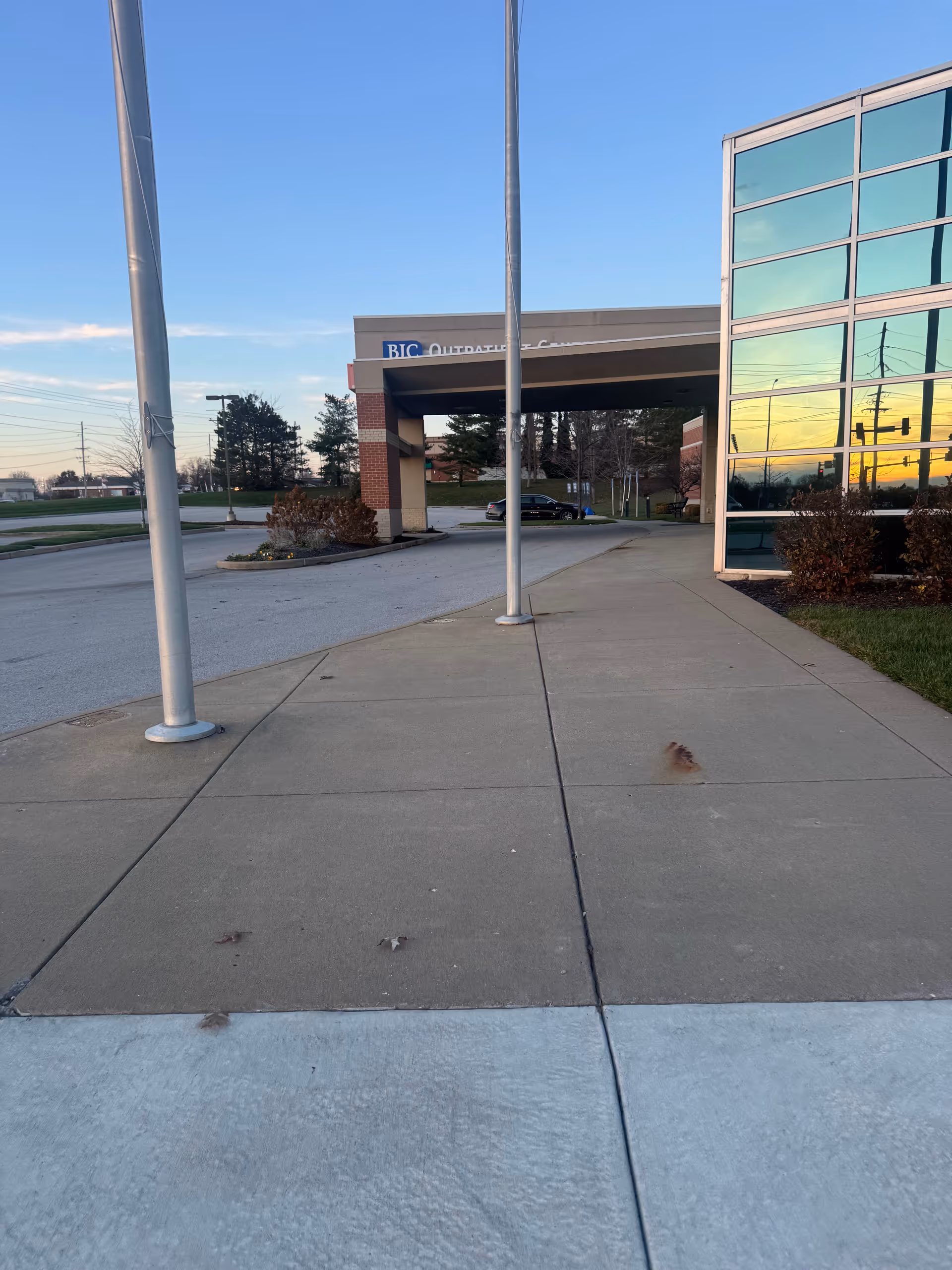 Exterior view of BJC Outpatient Center at O'Fallon with glass facade and entrance canopy.