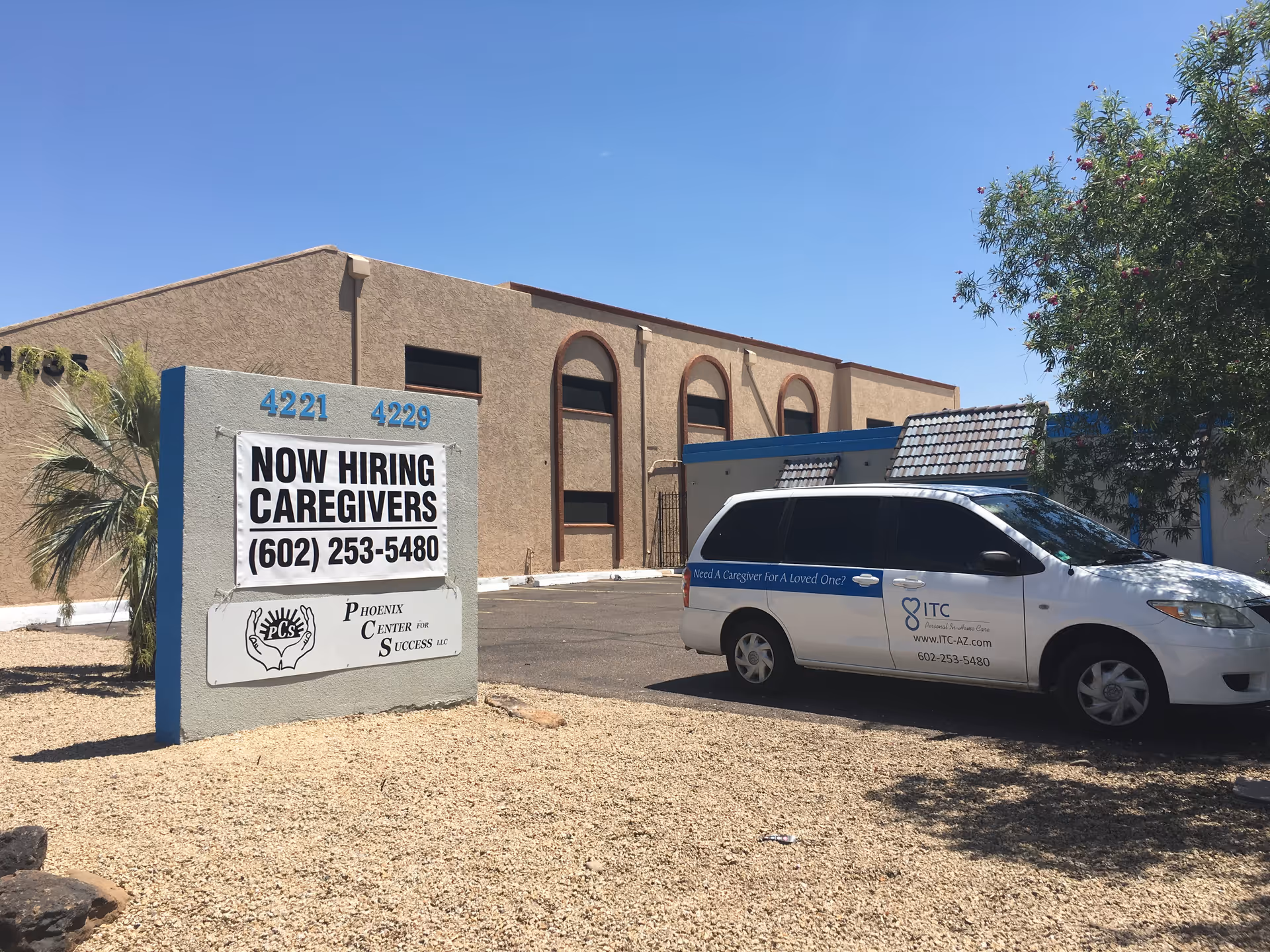Exterior view of Pathways For Life Phoenix with a Now Hiring Caregivers sign.