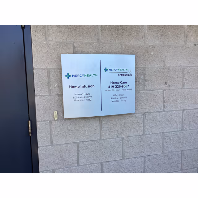 Exterior brick wall with Mercy Health Home Care signboard