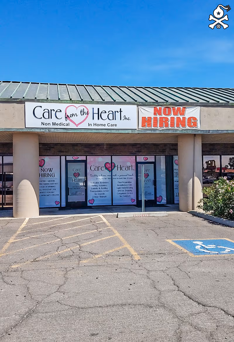 Front view of Care from the Heart, Inc. facility with a Now Hiring sign.