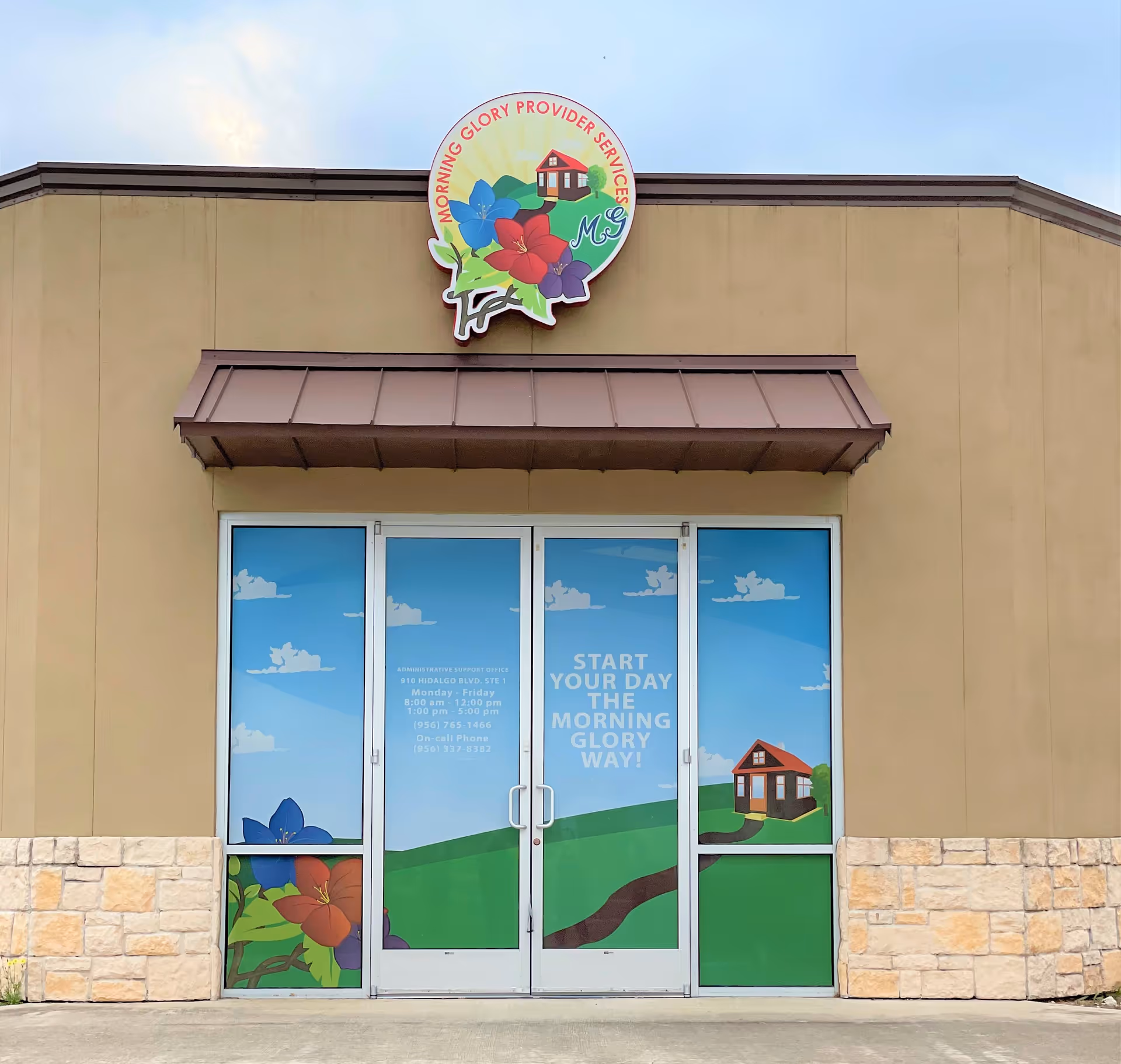 Front of Morning Glory Provider Services building with colorful logo and glass doors