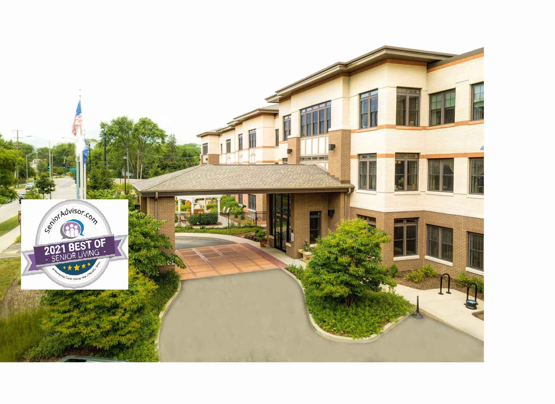 Exterior view of The Auberge at Highland Park, showing entrance, driveway, and landscaping.