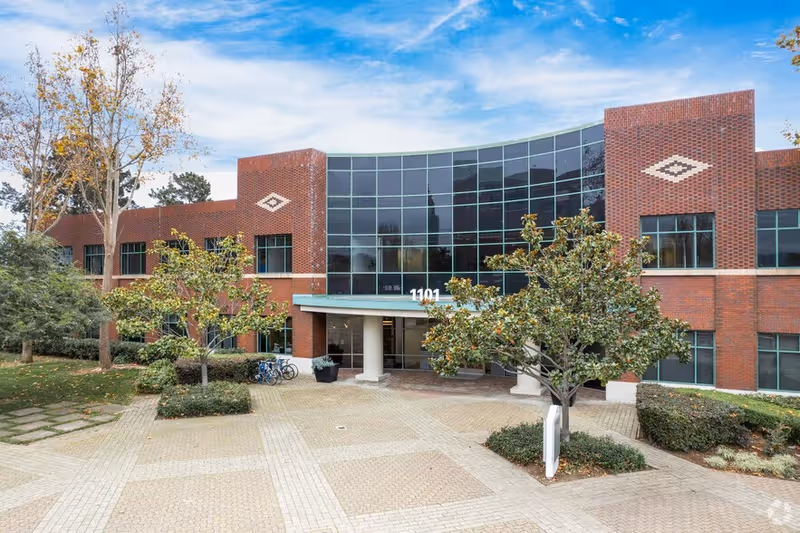 Exterior view of Beulah Home Care LLC facility with brick walls and glass entrance.