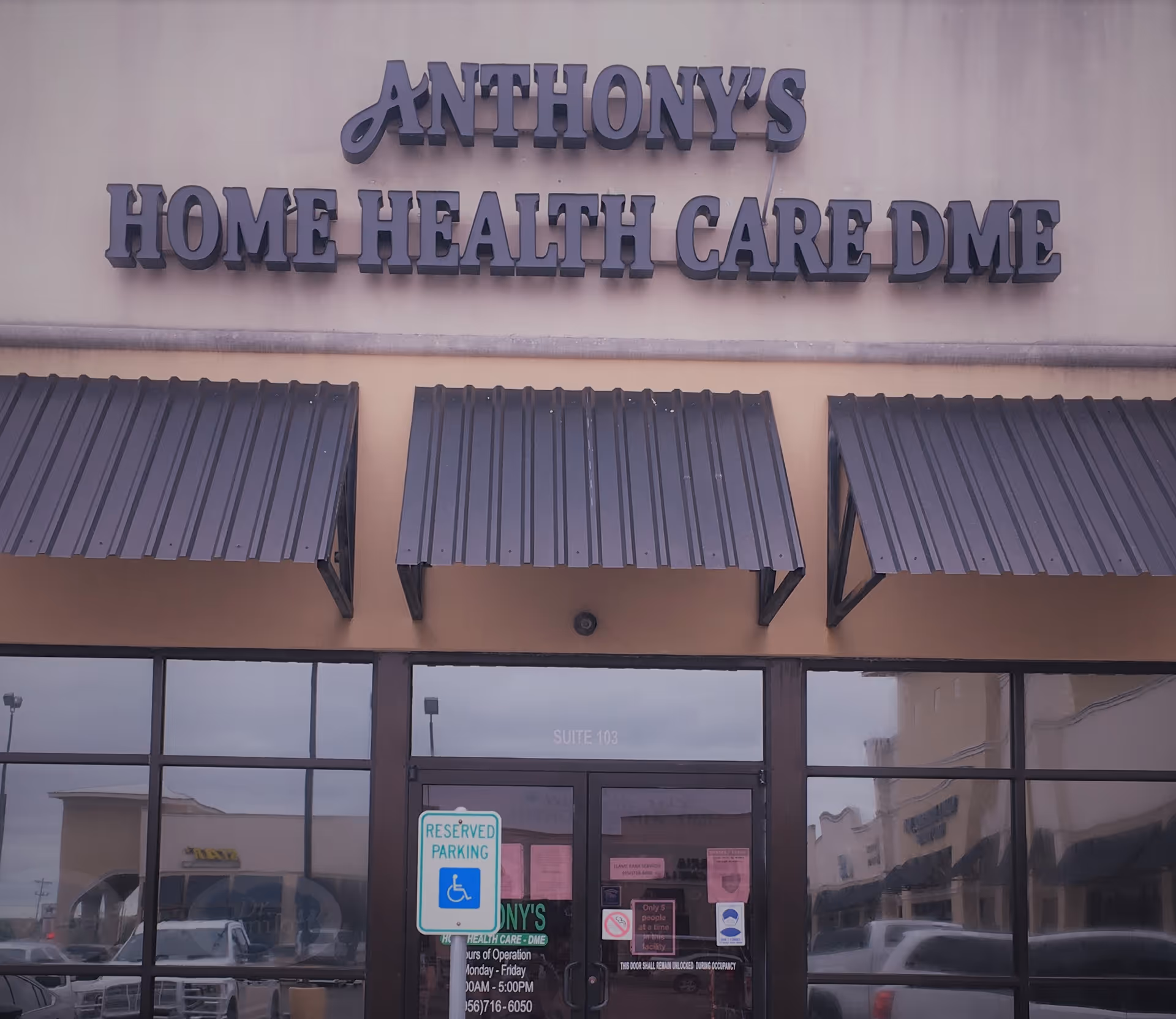 Exterior view of a storefront reading Anthony's Home Health Care DME with glass doors.