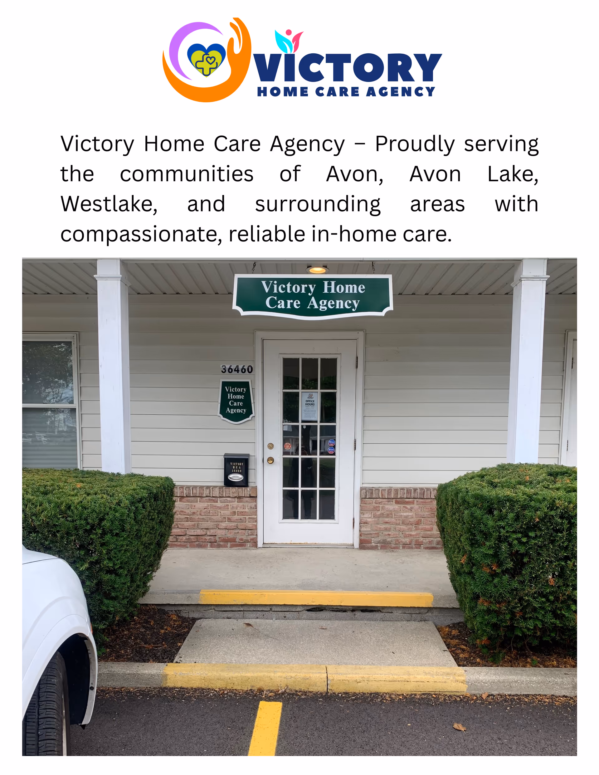 Front entrance of Victory Home Care Agency with sign, glass door, and neatly trimmed shrubs.