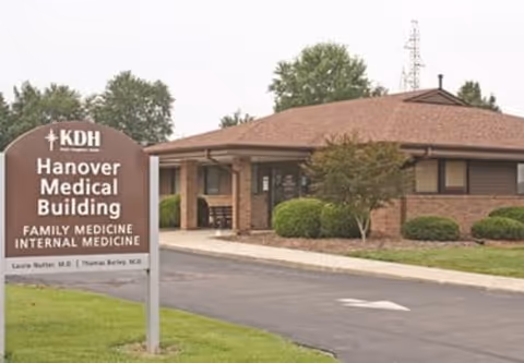 Exterior view of Hanover Medical Building with brick facade and manicured lawn.