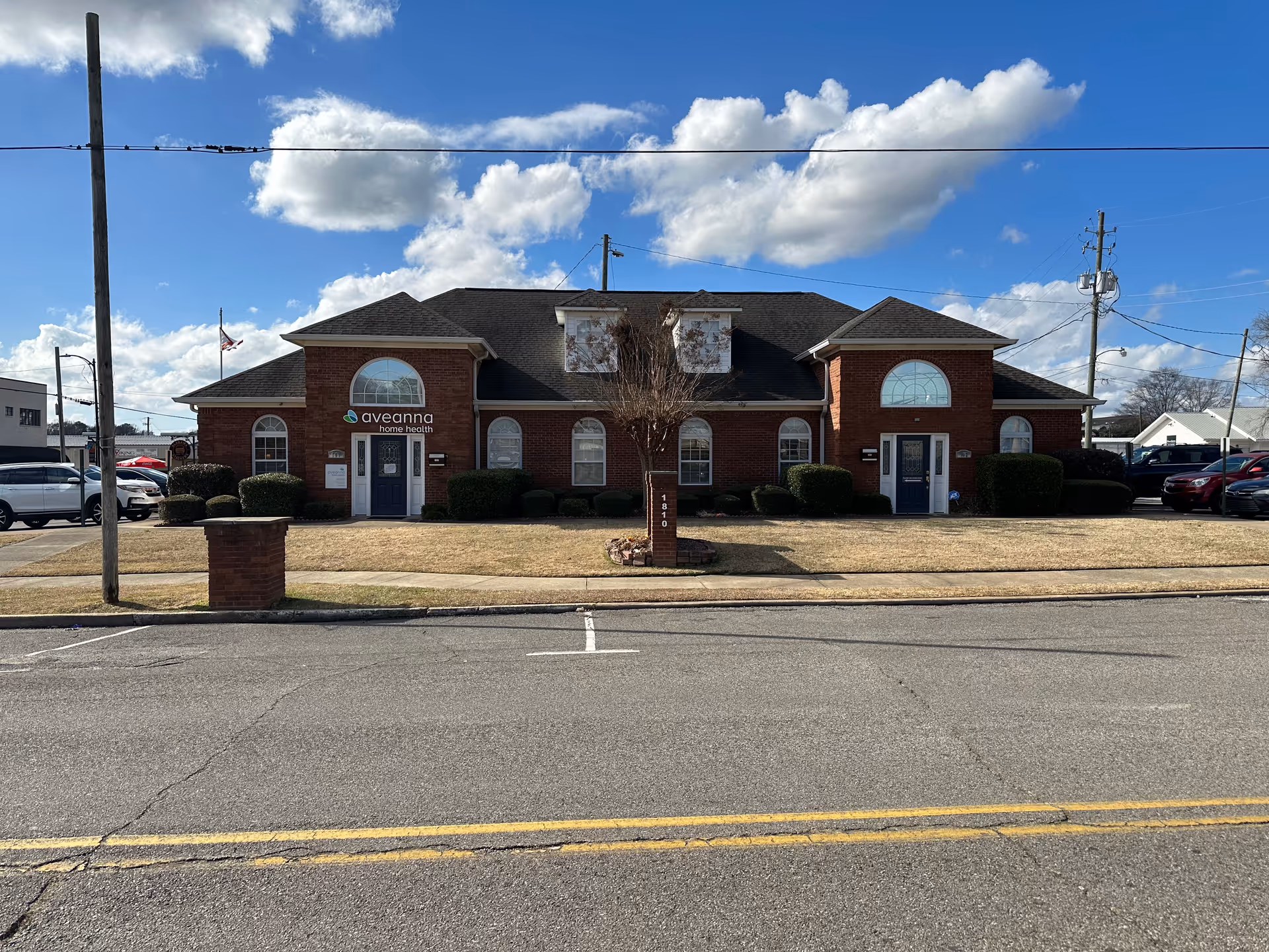 Brick Aveanna Home Health of Jasper building with two entrances.