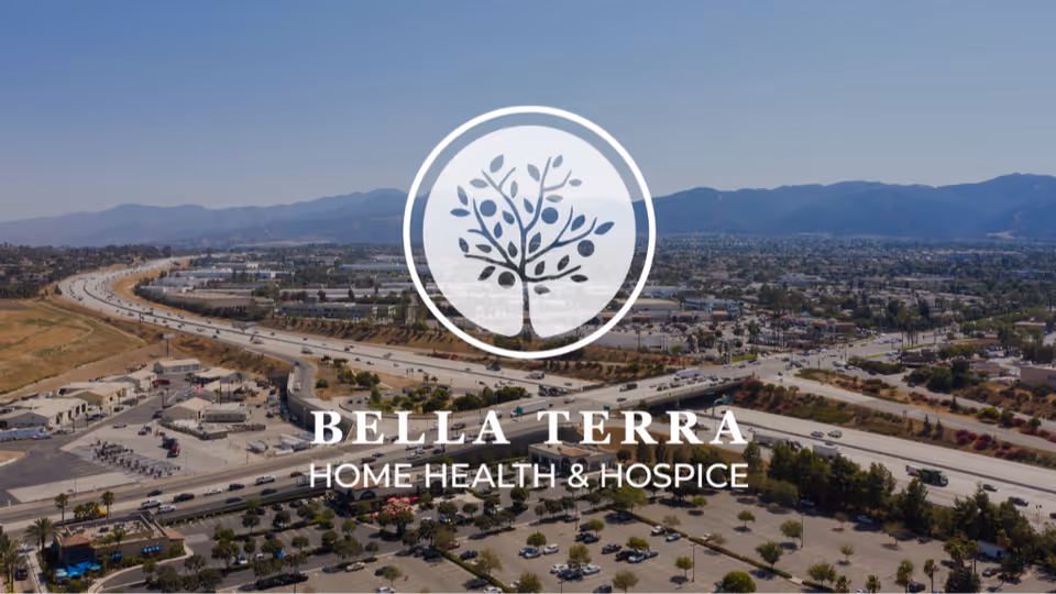 Aerial view of Bella Terra Hospice campus with logo overlay and surrounding roads.