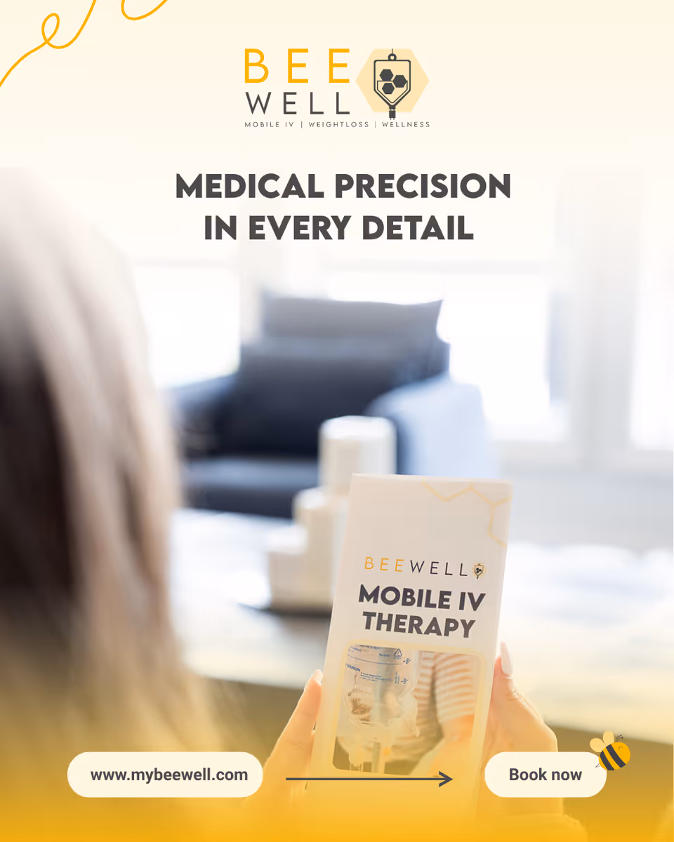 Person holds Bee Well Mobile IV Therapy brochure in a bright, cozy living room.