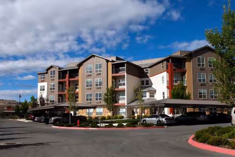 Exterior view of MorningStar Senior Living of Sparks building under blue sky.