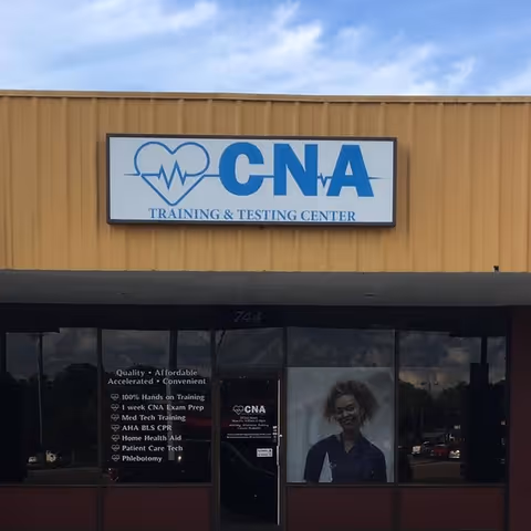Front exterior of CNA Training & Testing Center with blue sign above entrance.