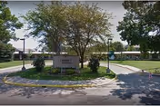 Exterior view of Avera Mother Joseph Manor entrance with a landscaped sign and trees.