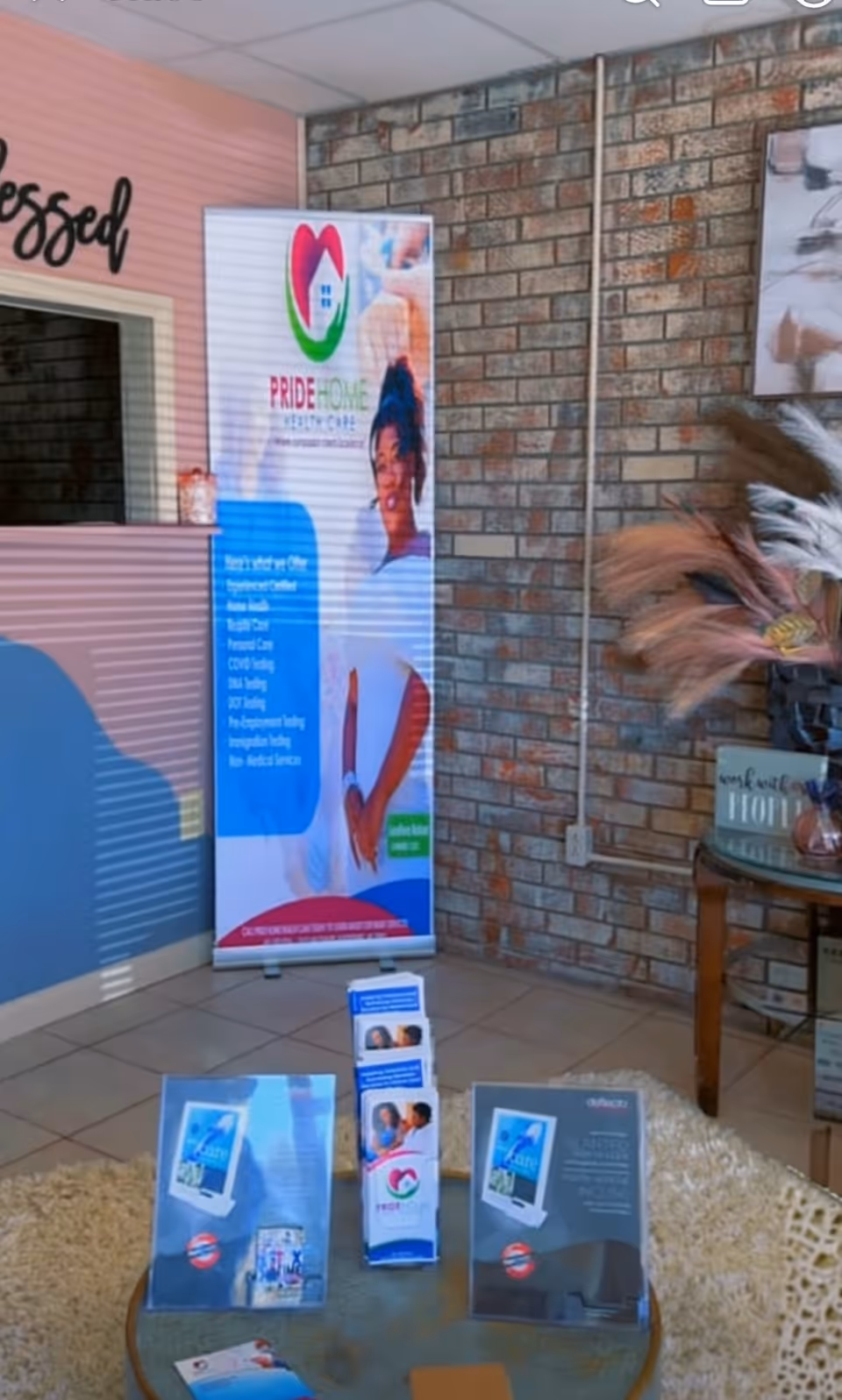 Interior lobby with Pride Home Health Care banners and brochures on display