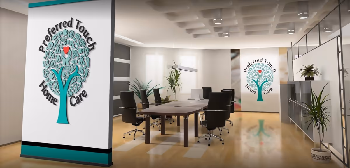 Modern conference room with a long table, black chairs, and tree logo walls.