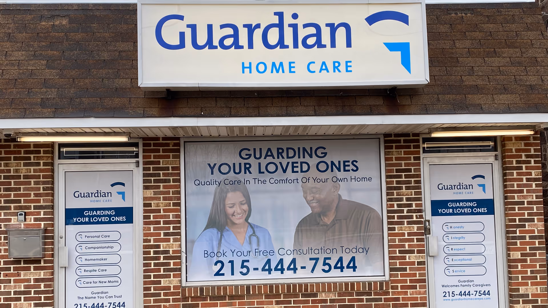Front view of Guardian Home Care storefront with sign and promotional banner.