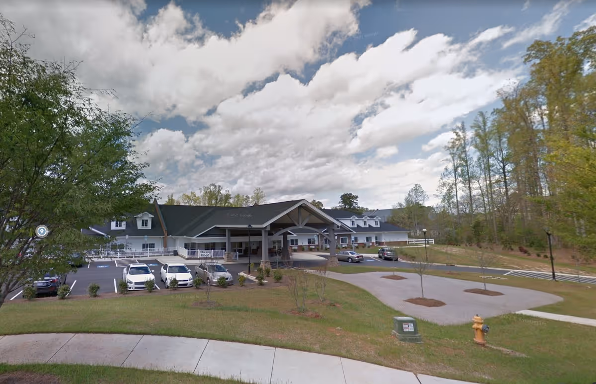Exterior view of Ranson Ridge at the Villages of Mecklenburg with a covered entrance.