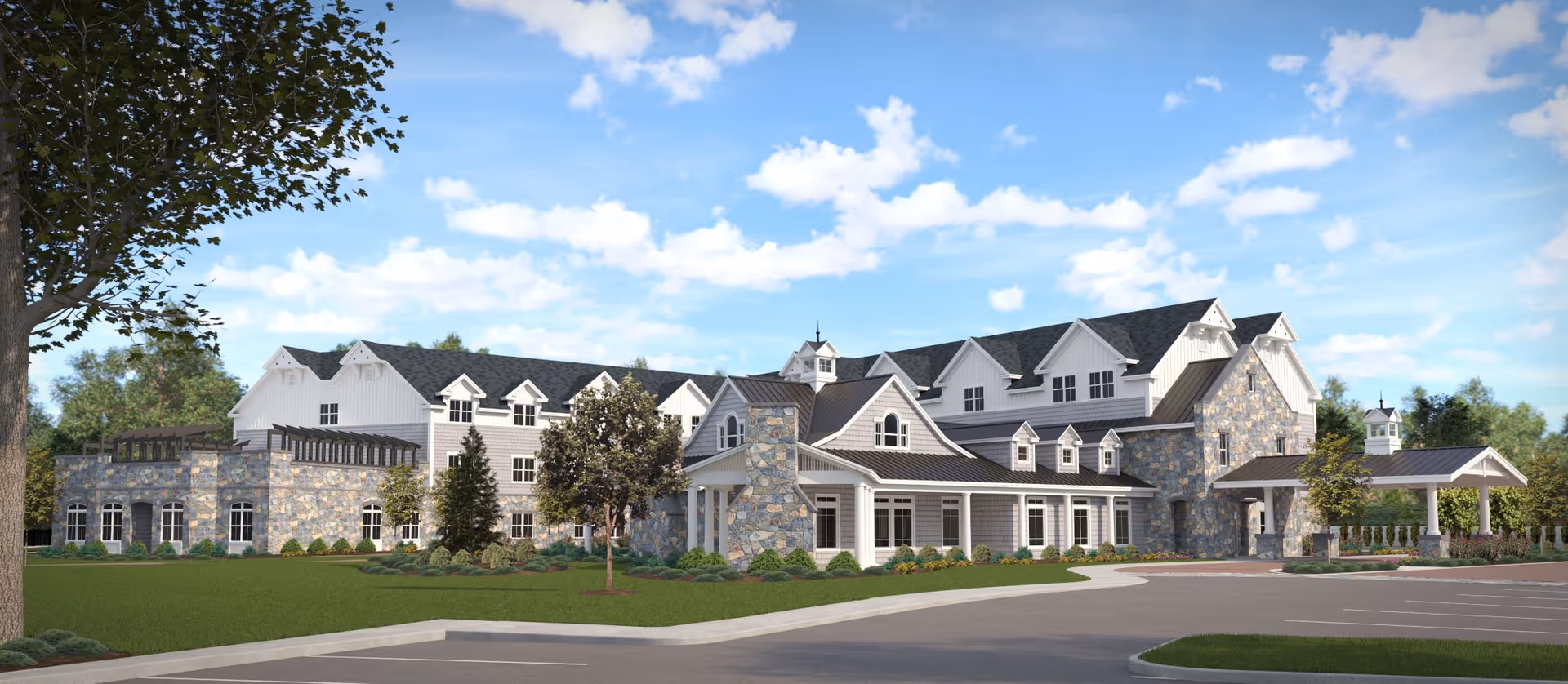 Exterior view of Maplewood at Southport, a stone-and-white senior living campus with landscaping.
