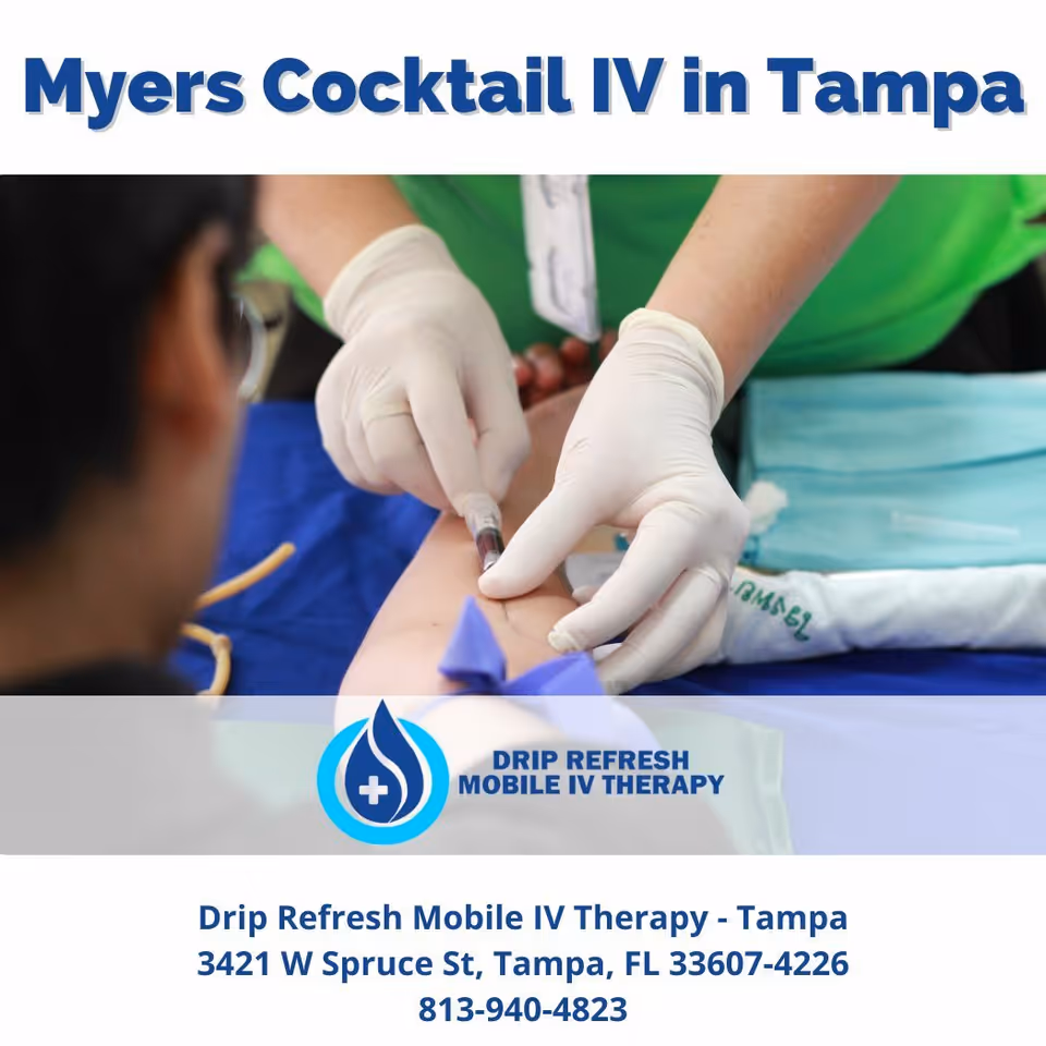 Gloved clinician administers IV therapy to a patient's arm.