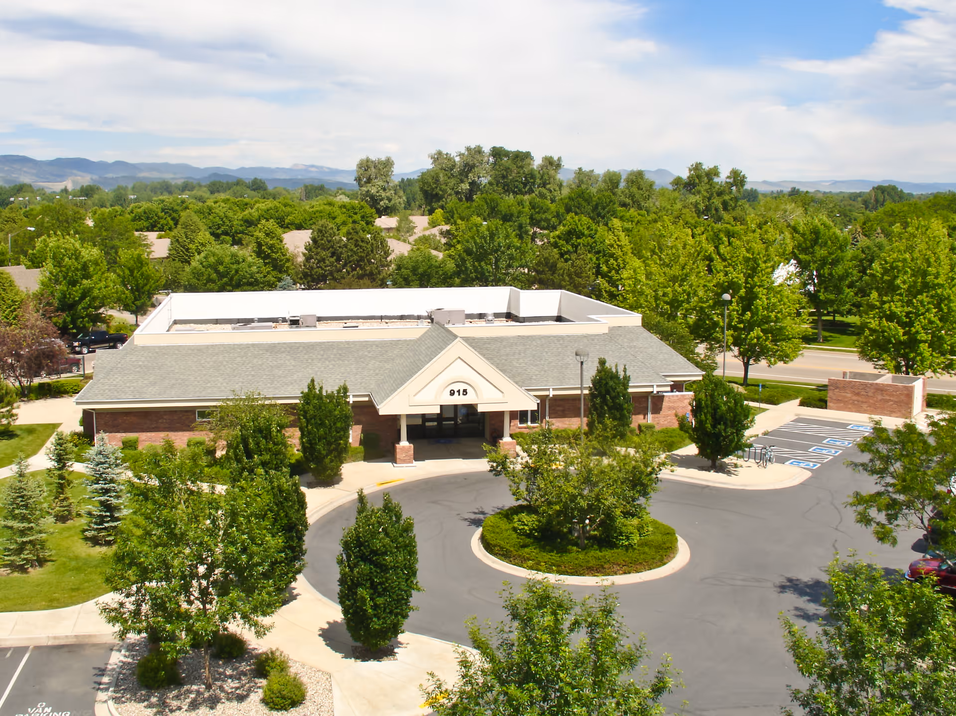 Aerial view of Columbine Poudre Home Care facility with a circular driveway.