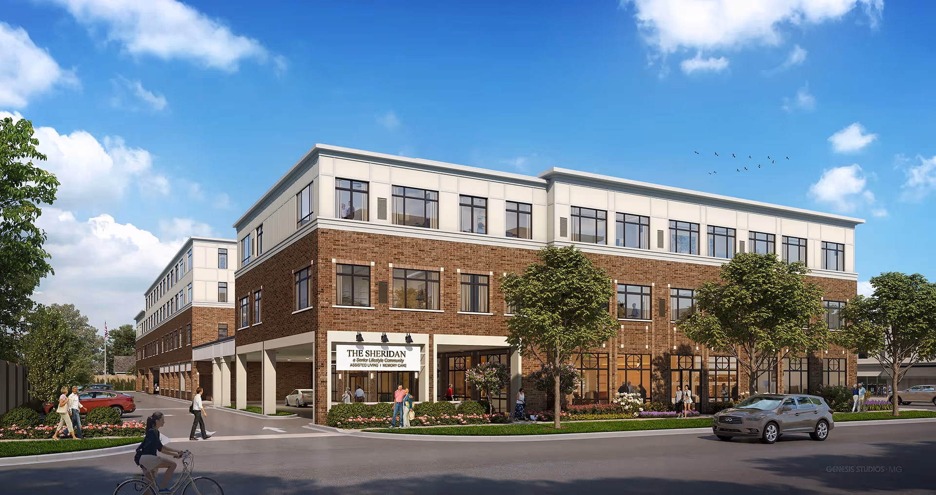 Three-story brick senior living building with a sign for The Sheridan at the entrance, trees and people outside under a blue sky.