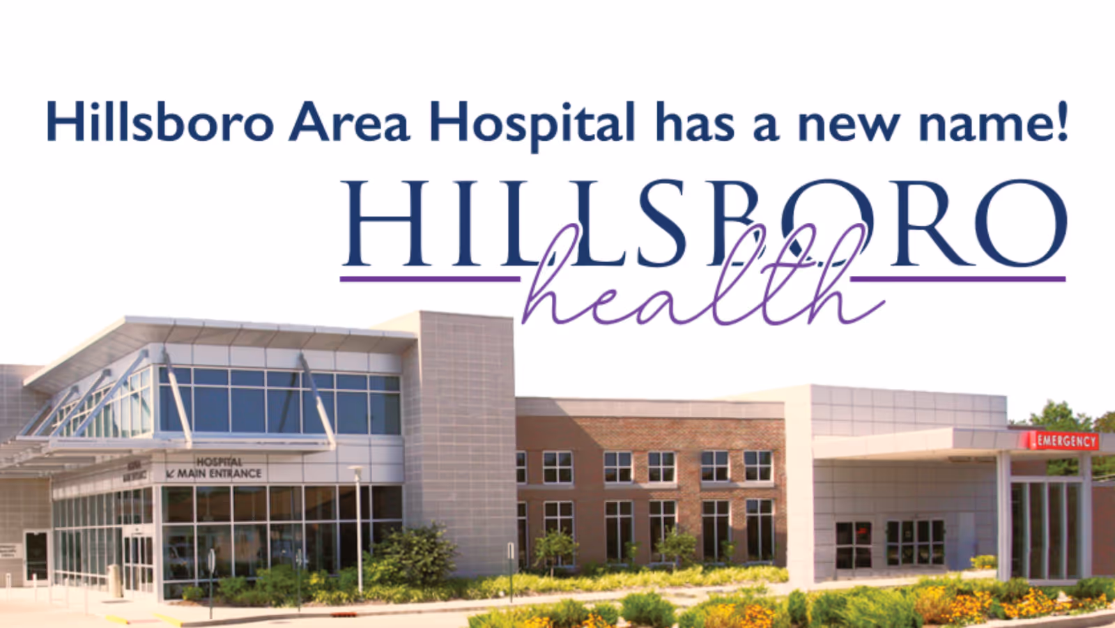 Exterior view of Hillsboro Health hospital building with glass entrance and landscaping.