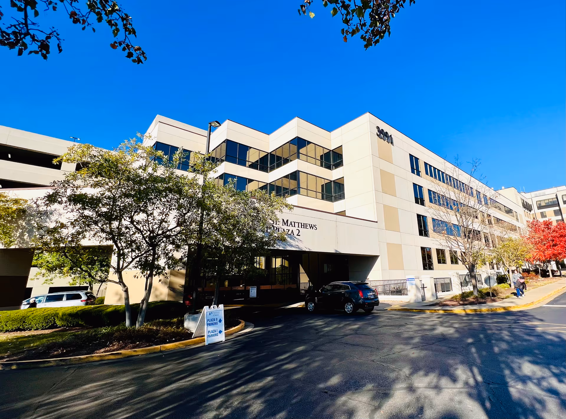 Exterior view of Norton St. Matthews Medical Plaza 2 building with trees and clear sky.
