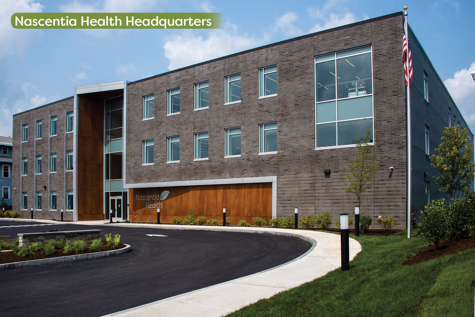 Exterior view of Nascentia Health Headquarters building with driveway and landscaping.