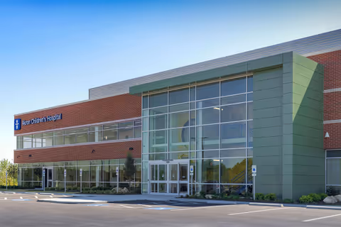 Exterior view of Akron Children's Hospital entrance with glass doors