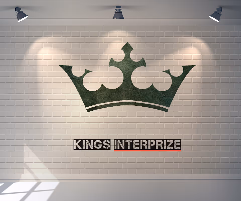 Interior wall featuring a large crown logo and 'KINGS INTERPRIZE' branding under spotlights.