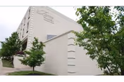 Exterior view of Regency Healthcare & Rehab Center building with trees nearby