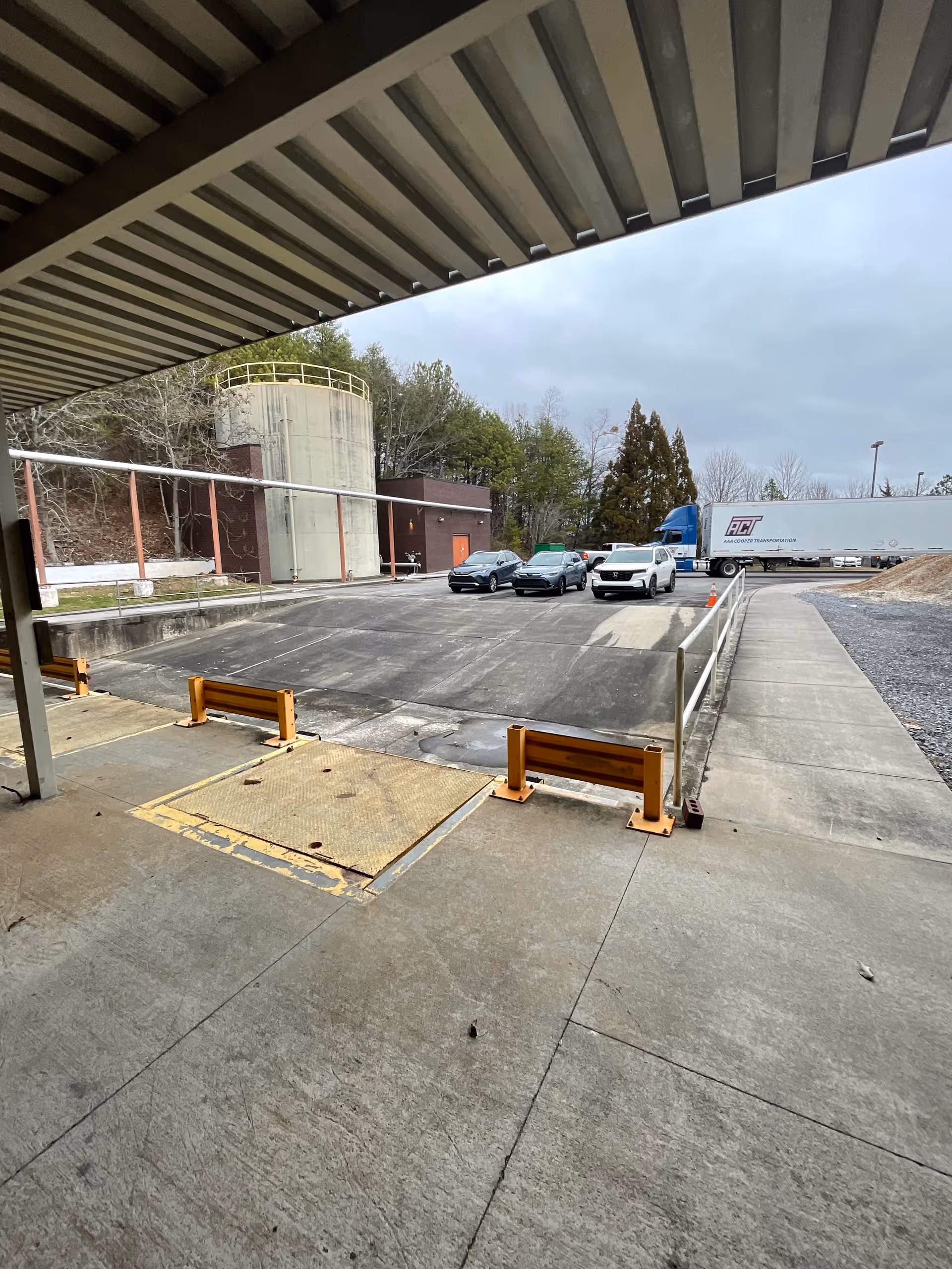 Exterior loading dock and parking lot at Hamilton Home Health facility.