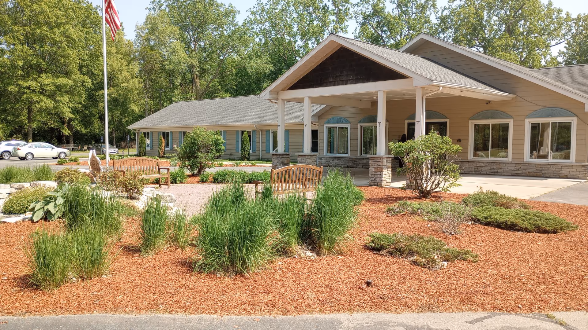 Exterior view of Vibrant Life of Temperance facility with landscaped front yard.