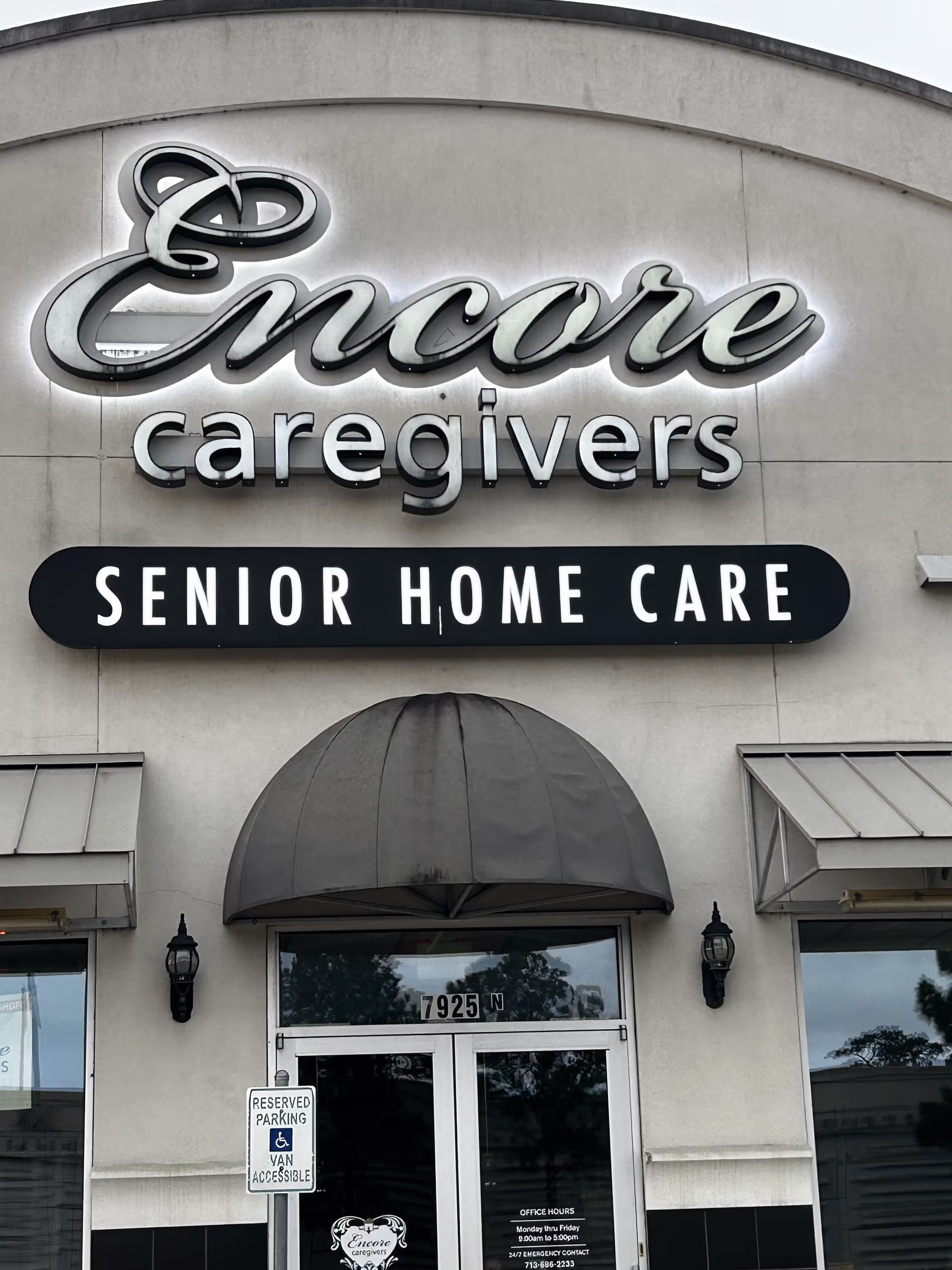 Front facade of Encore Caregivers Senior Home Care with large illuminated sign.