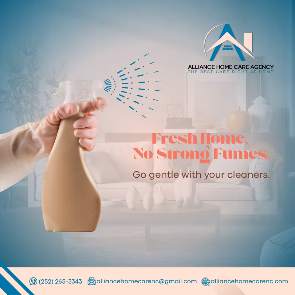Hand grips a spray bottle in a living room with Alliance Home Care Agency logo.