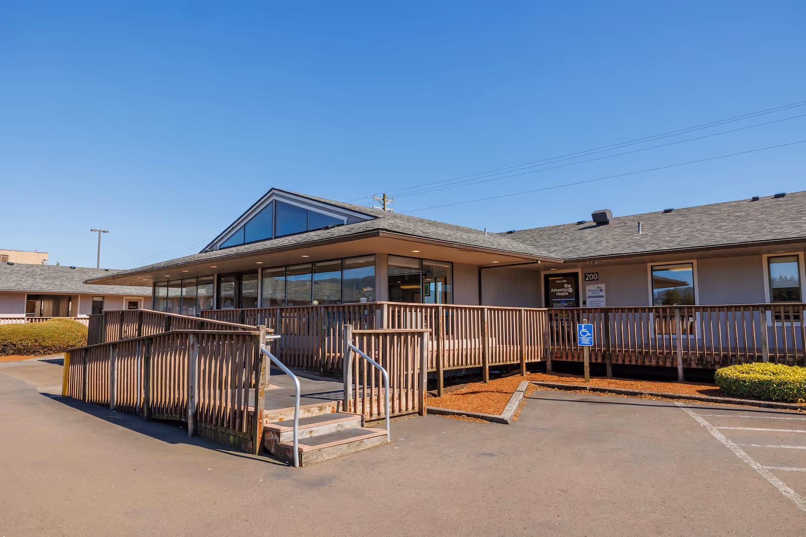 Exterior view of Adventist Health Home Care and Hospice Services building with ramp entrance