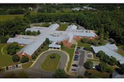 Aerial view of Elizabeth Adam Crump Health and Rehab facility with circular driveway and parking.