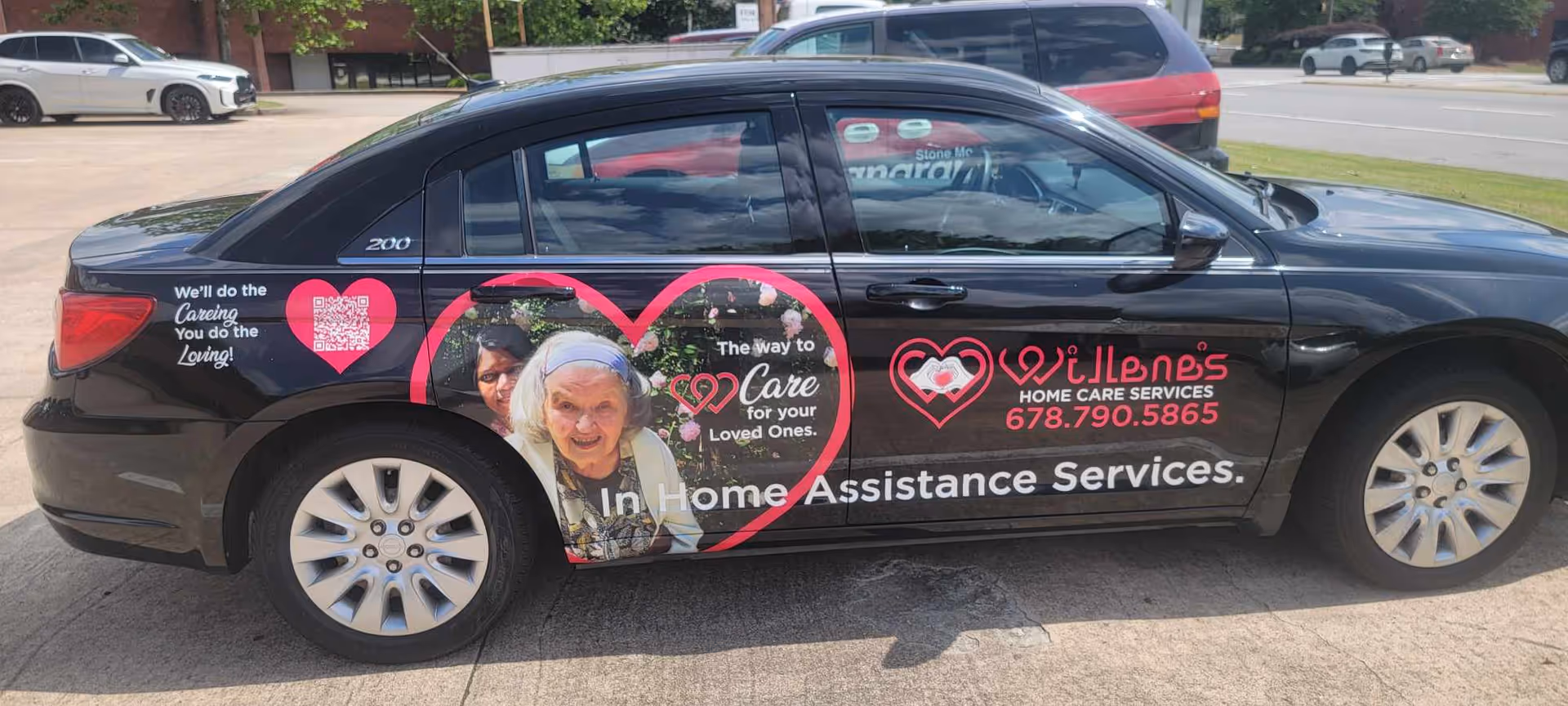 A black car wrapped with Willene's Home Care Services branding and elderly care imagery.
