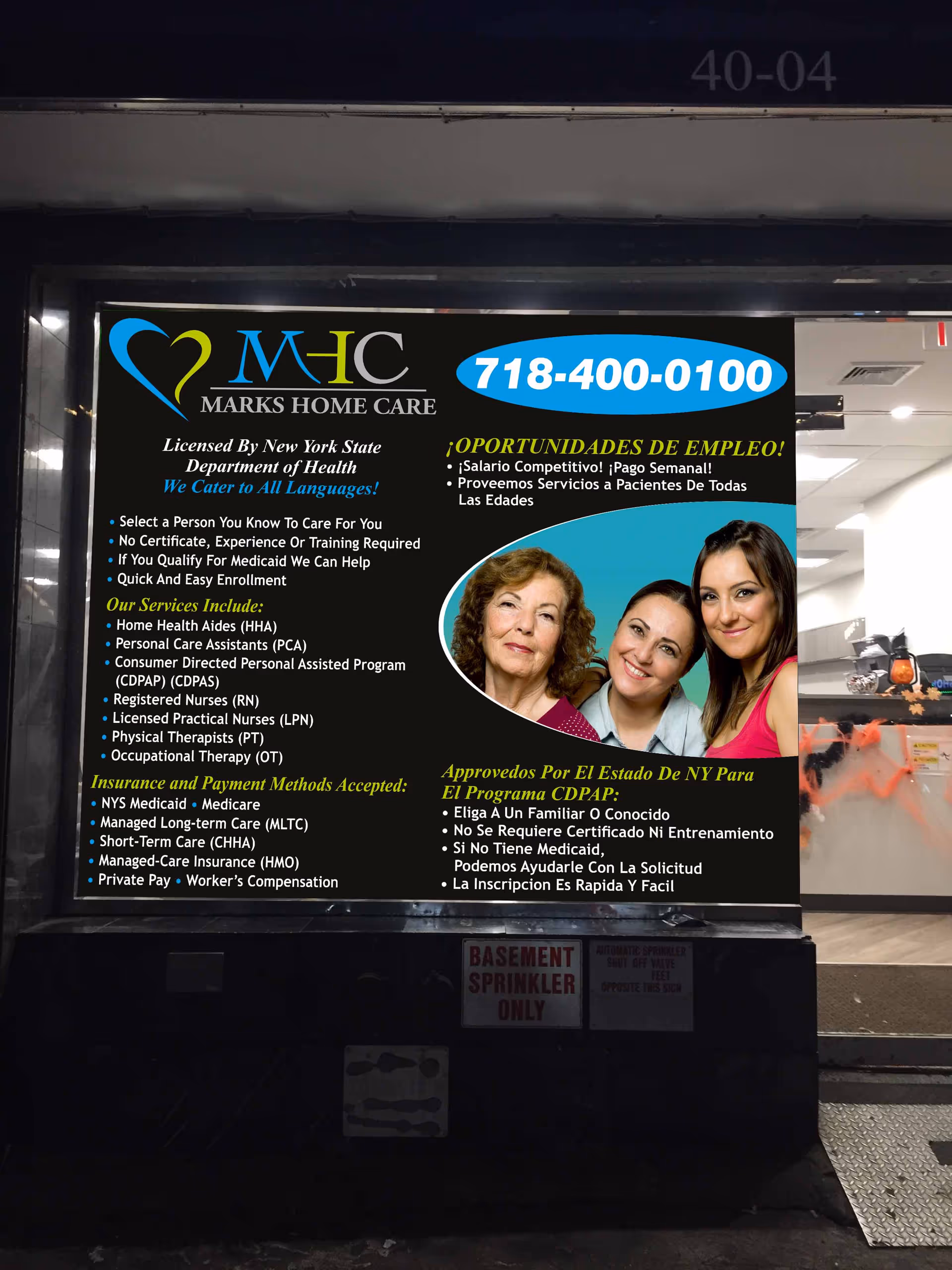 A large advertising sign for Marks Home Care with photos and service details inside a building.