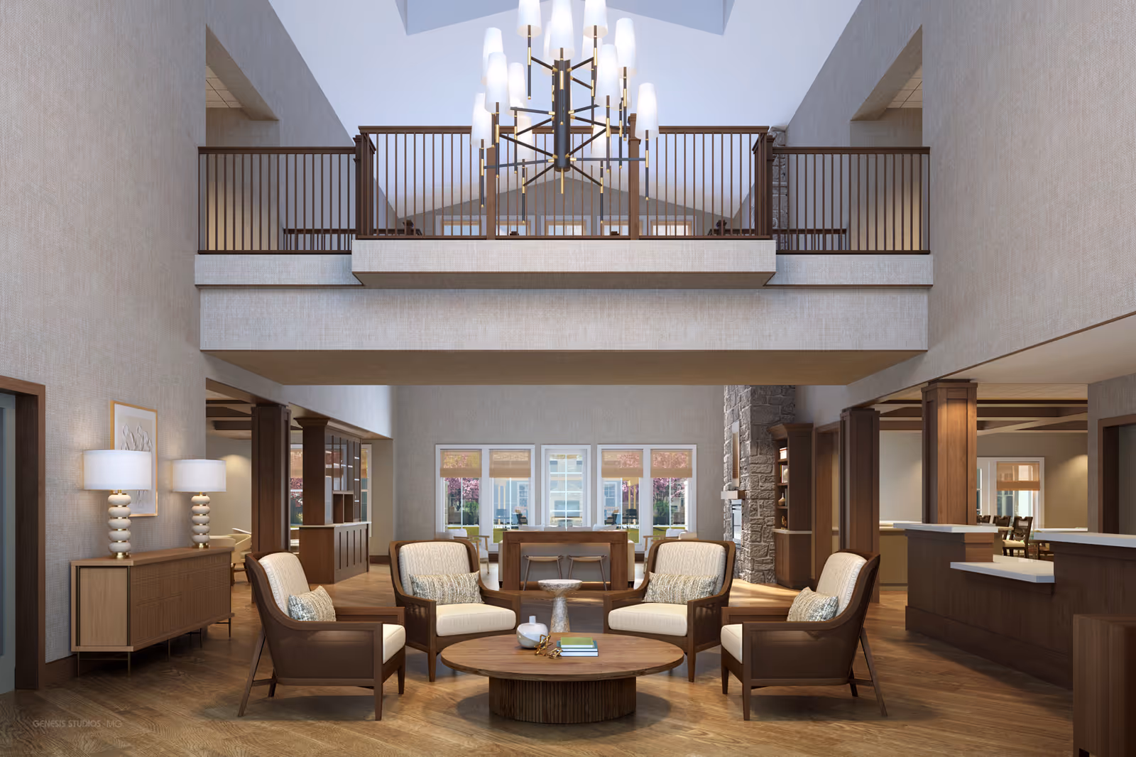 Spacious senior living lobby with high ceiling, chandelier, balcony railing, and circular seating.