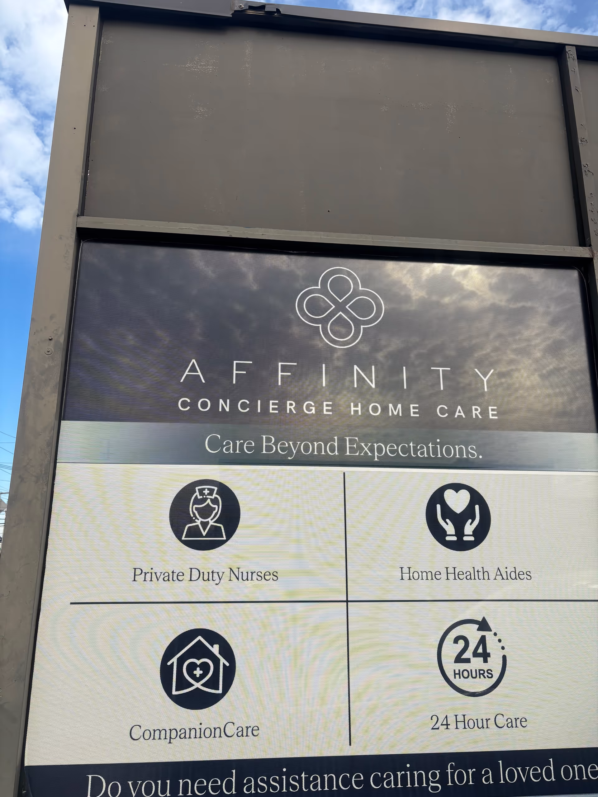 Front outdoor sign for Affinity Concierge Home Care with service icons.