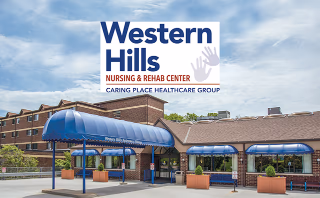 Exterior view of Western Hills Retirement Village entrance with blue canopies.