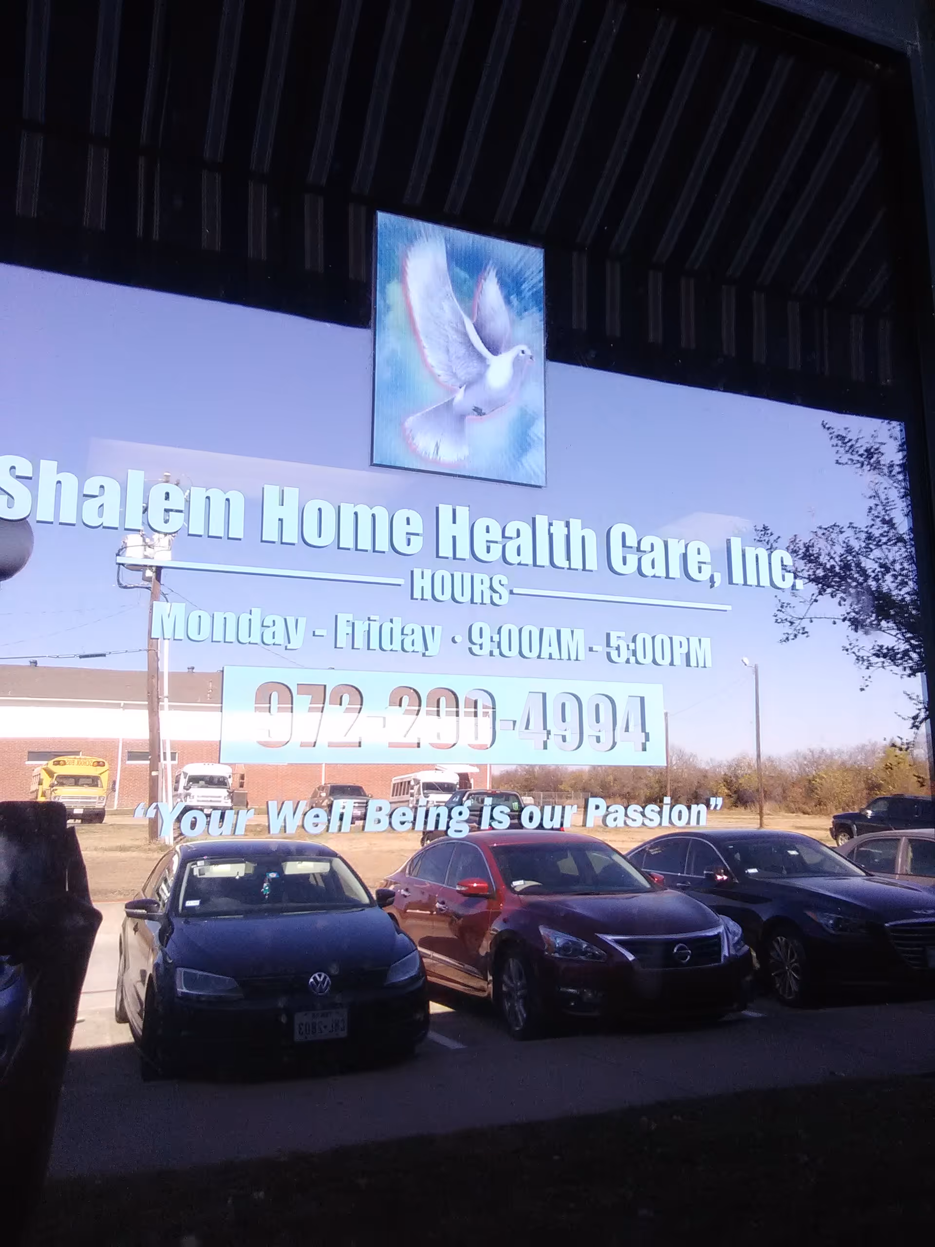 Front exterior sign reads Shalem Home Health Care, Inc with hours and parked cars.