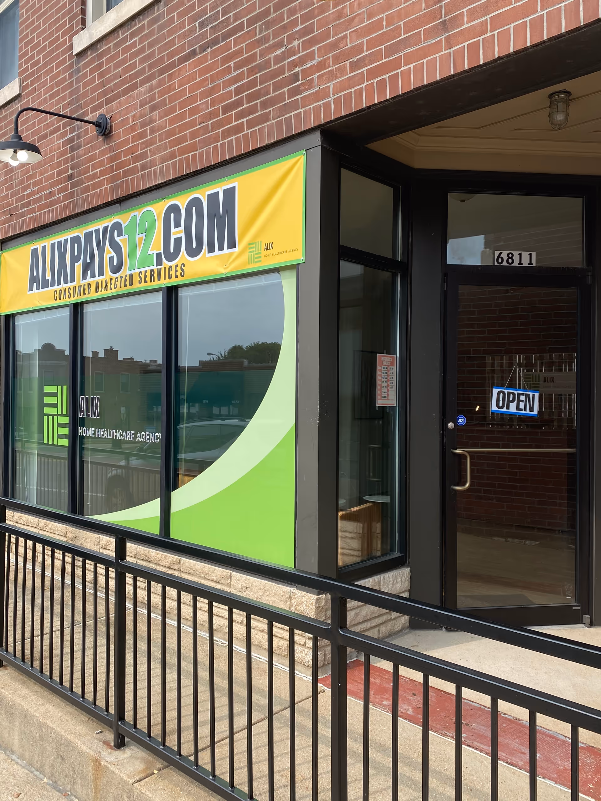 Exterior storefront of Alix Home Health Care with open door and signage.