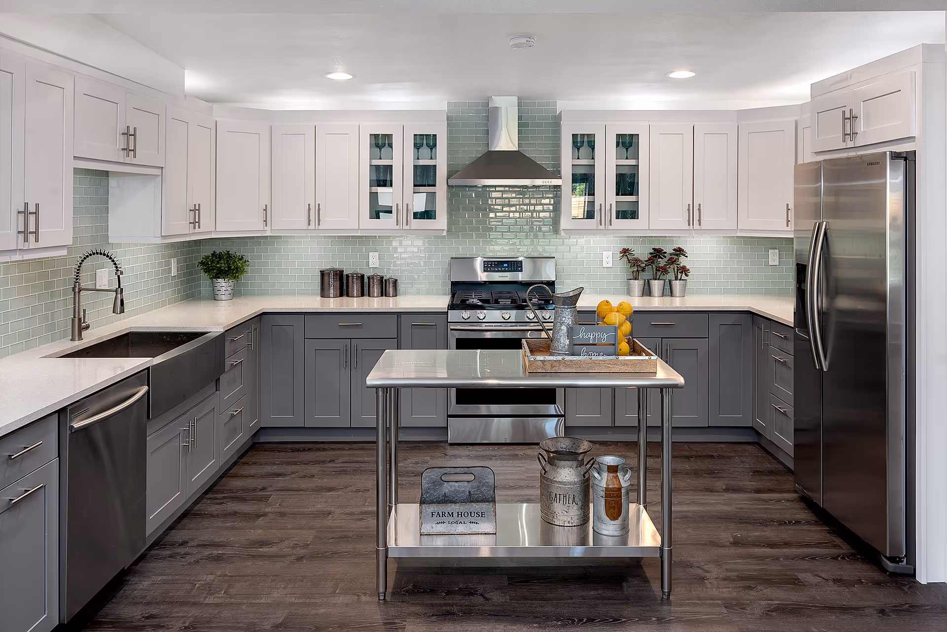 Ashford at Lake Ballinger kitchen: bright, modern, white uppers, gray lowers, stainless appliances.