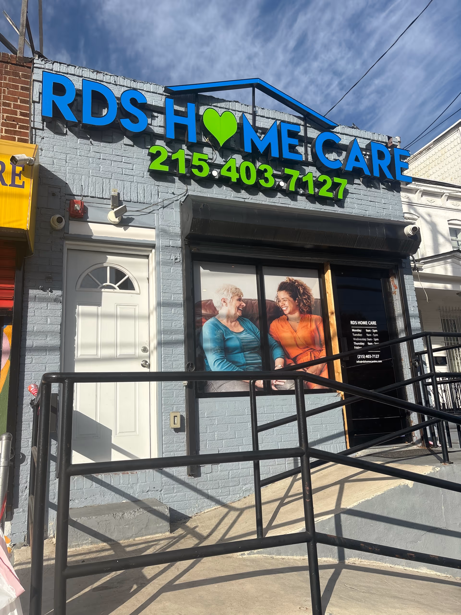 Exterior storefront for RDS Home Care with a ramp and large sign above.