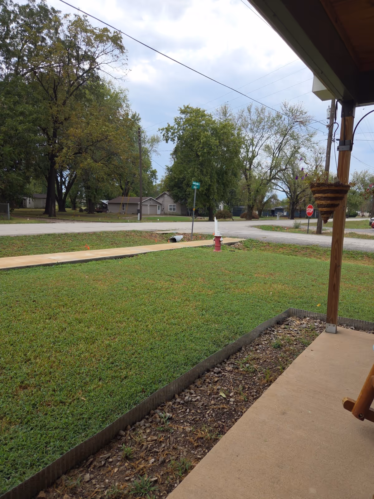 Front yard and street view from a covered porch.